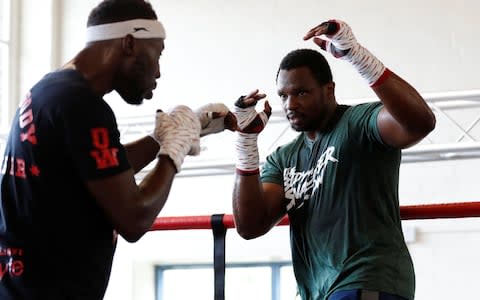 Dillian Whyte (right) training - Credit: action images