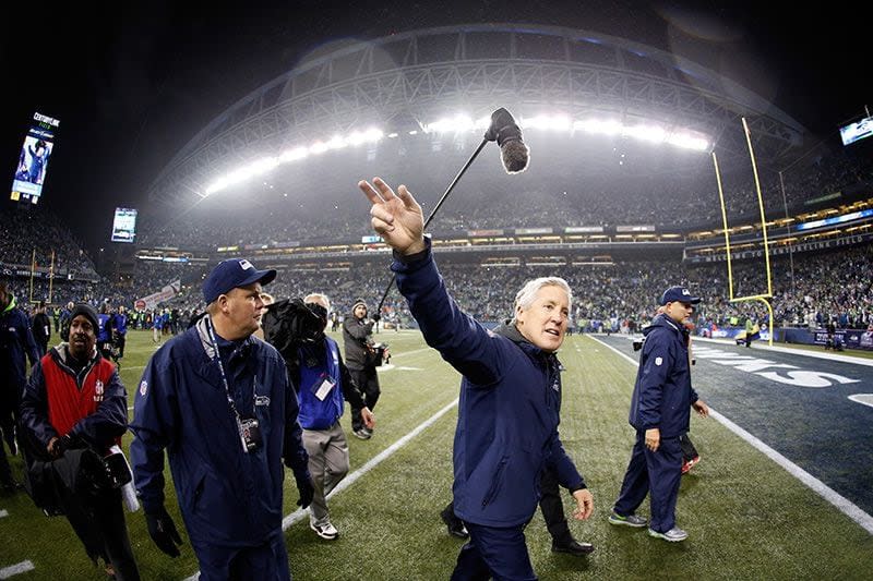 SEATTLE, WA - JANUARY 10:  Head coach Pete Carroll of the Seattle Seahawks walks off the field after defeating the Carolina Panthers after their 2015 NFC Divisional Playoff game at CenturyLink Field on January 10, 2015 in Seattle, Washington. The Seattle Seahawks defeated the Carolina Panthers 31 to 17.  (Photo by Otto Greule Jr/Getty Images)