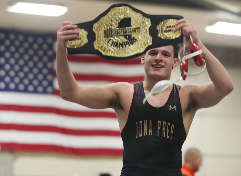 Iona's Kosta Koufalis and Croton's Henry Martin wrestle in the 152-pound weight class during the Westchester County wrestling championship at Yonkers High School Jan. 20, 2024. Koufalis won the match.