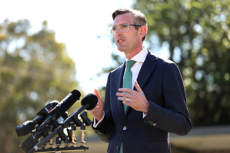 SYDNEY, AUSTRALIA - OCTOBER 18: Premier of NSW, Dominic Perrottet speaks during a press conference in Randwick on October 18, 2021 in Sydney, Australia. COVID-19 restrictions have eased further for fully vaccinated people across NSW today after the state passed its 80 per cent double vaccination target. Kindergarten, year 1 and year 12 students are able to return to school from today, while community sport is able to resume and face masks are no longer required in offices. (Photo by Brendon Thorne/Getty Images)