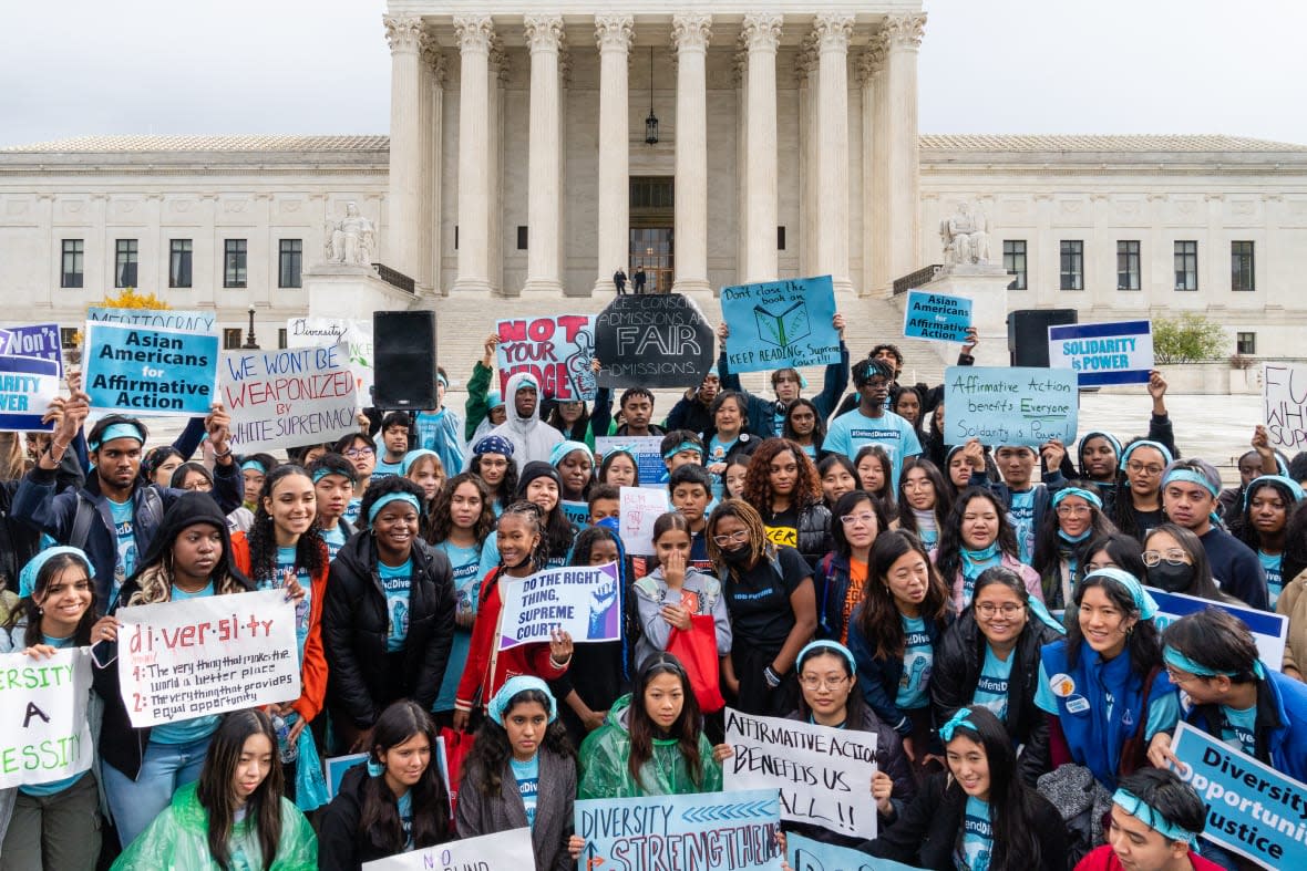 Supporters pose for a group photo during a rally in support affirmative action policies outside the Supreme Court in Washington, D.C. on October 31, 2022. (Eric Lee for The Washington Post via Getty Images)