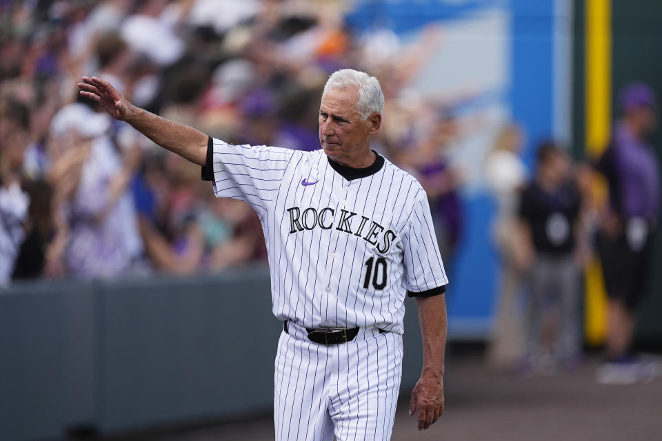 Colorado Rockies manager Bud Black waves during the team's ceremonial walk around the field to acknowledge fans following a loss in the team's season finale Sunday, Sept. 29, 2024, in Denver. (AP Photo/David Zalubowski)