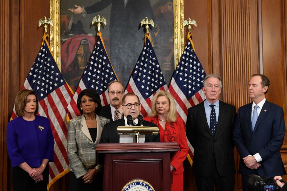 From left House Speaker Nancy Pelosi, D-Calif.; Chairwoman of the House Financial Services Committee Maxine Waters, D-Calif.; Chairman of the House Foreign Affairs Committee Eliot Engel, D-N.Y.; House Judiciary Committee Chairman Jerrold Nadler, D-N.Y.; Chairwoman of the House Committee on Oversight and Reform Carolyn Maloney, D-N.Y.; House Ways and Means Chairman Richard Neal, D-Mass.;  and Chairman of the House Permanent Select Committee on Intelligence Adam Schiff, D-Calif., unveil articles of impeachment against President Donald Trump, during a news conference Dec. 10, 2019.