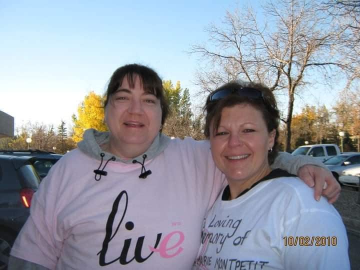 Cheryl Harvey (left) with a friend at a Run For The Cure event in October 2010. 