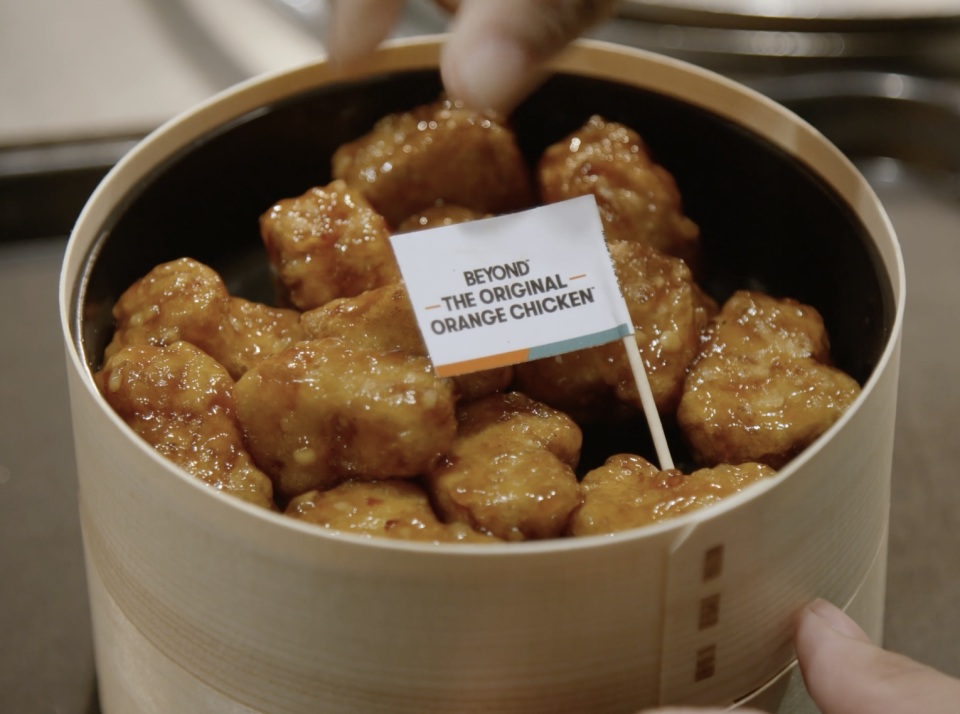 A bowl of plant-based orange chicken