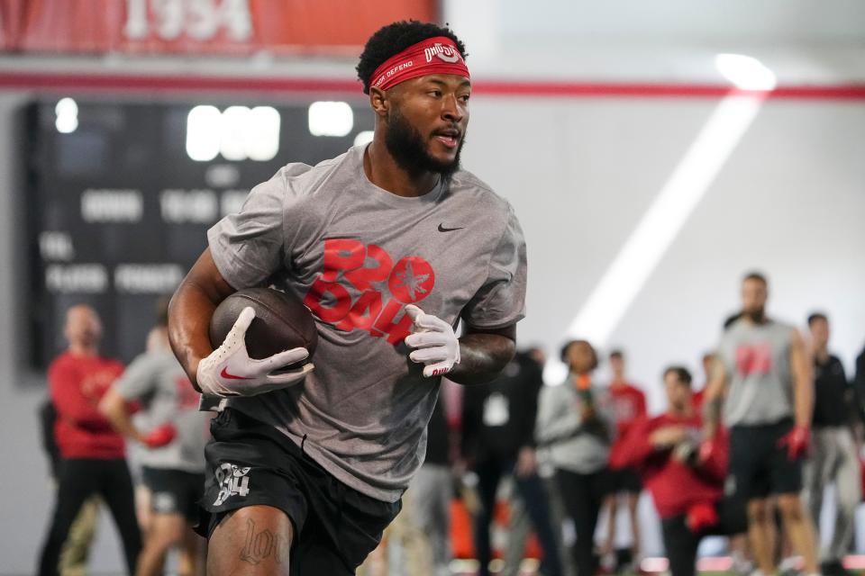 Ohio State's Xavier Johnson catches a pass during the Buckeye's pro day at the Woody Hayes Athletic Center.