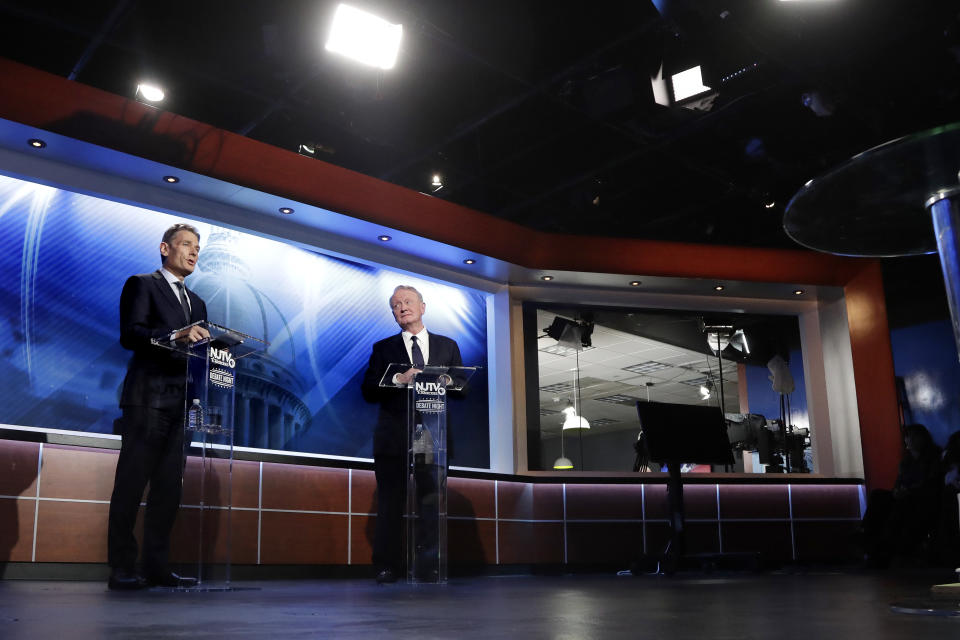 Democratic candidate Tom Malinowski, left, and Republican candidate Leonard Lance participate in a U.S. Congressional District 7 debate, Wednesday, Oct. 17, 2018, in Newark, N.J. (AP Photo/Julio Cortez)