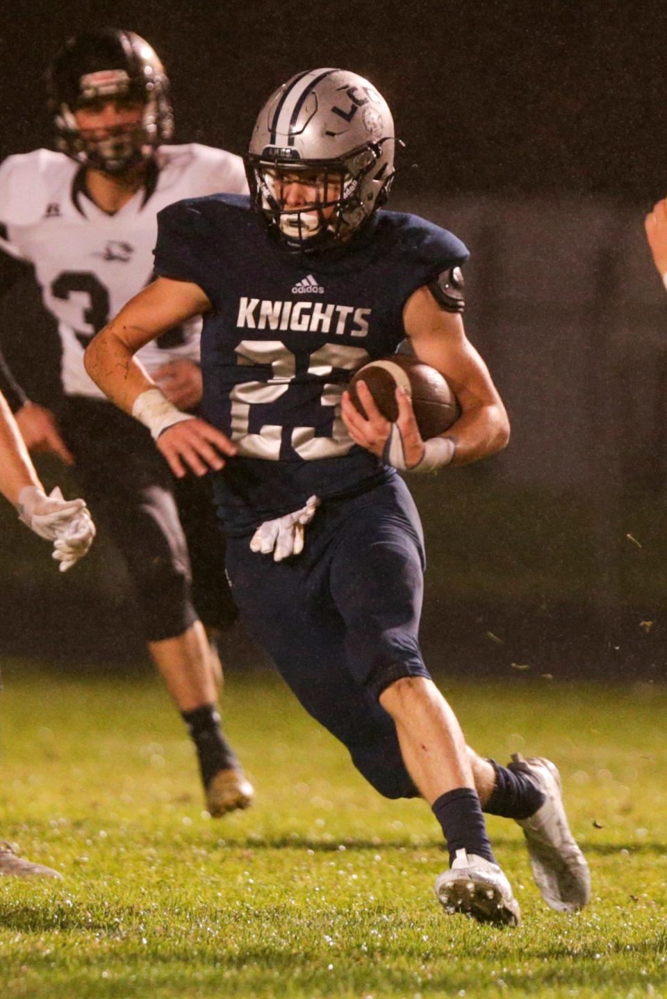 Central Catholic's Brinn Robbins (23) runs the ball during the second quarter of an IHSAA football game, Friday, Oct. 22, 2021 in Lafayette.