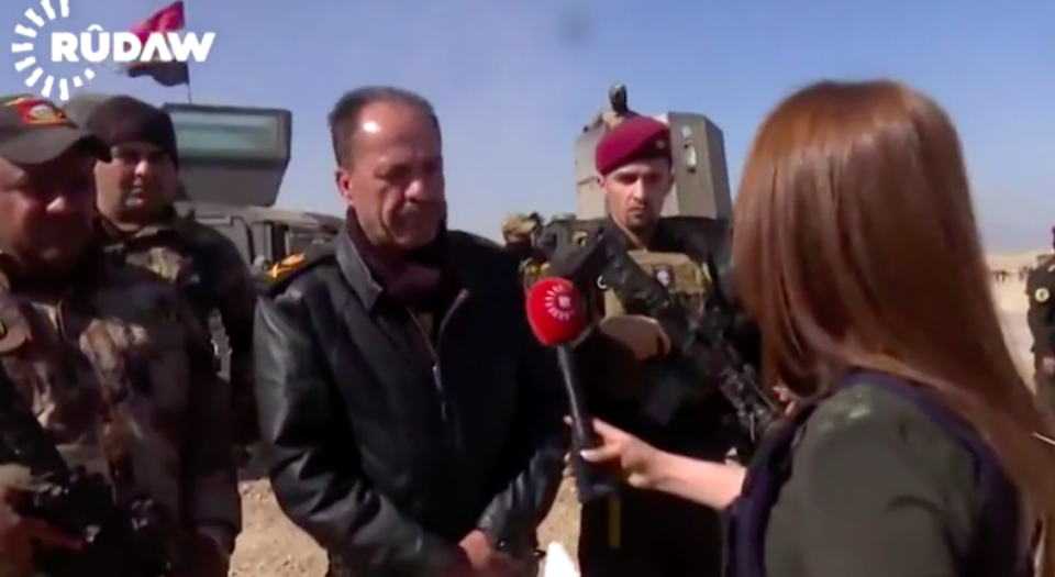 The reporter, seen here interviewing a military official in Mosul, has been remembered as brave in the face of danger. Photo: Rudow