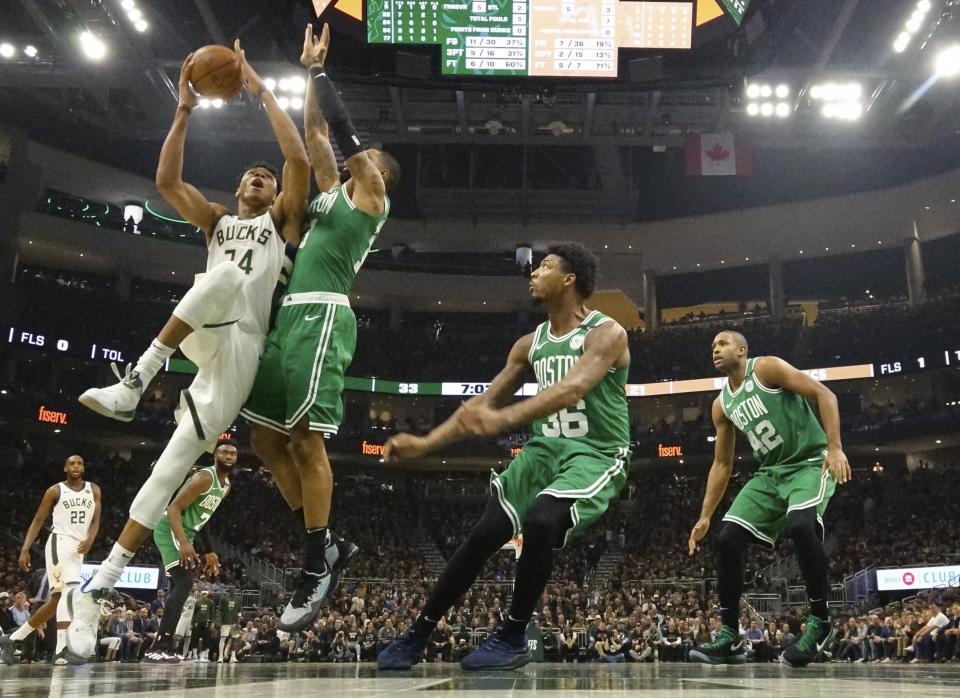 Milwaukee Bucks' Giannis Antetokounmpo shoots during the first half of Game 5 of a second round NBA basketball playoff series against the Boston Celtics Wednesday, May 8, 2019, in Milwaukee. (AP Photo/Morry Gash)