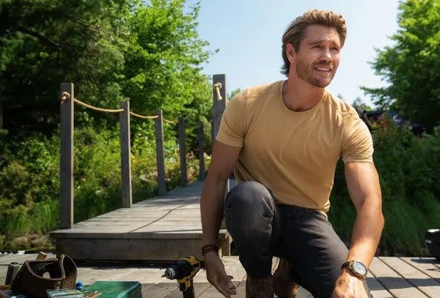 chad michael murray in sullivan's crossing, sitting on a dock