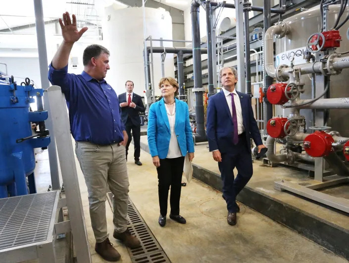 Engineer Rob Singer gives a tour of the Airfield Interim Mitigation System (AIMS) at the site of the former Pease Air Force Base to Sen. Jeanne Shaheen, D-New Hampshire, and EPA Region 1 Administrator David Cash Friday, Sept. 16, 2022.