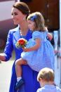 <p>At the airport in Berlin arriving for their German tour, Kate and Charlotte both embraced blue. </p>