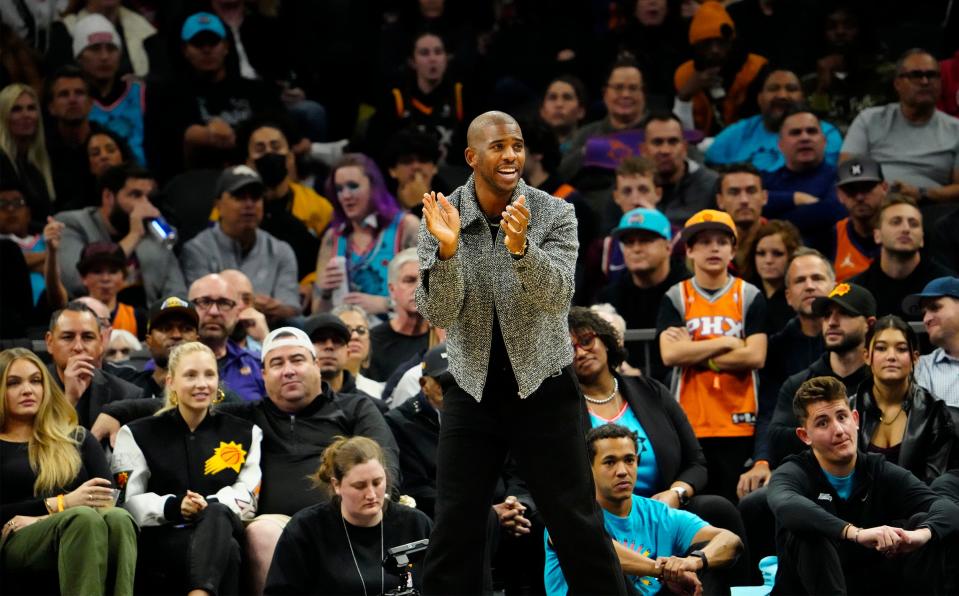 Phoenix Suns guard Chris Paul applauds during action against the Los Angeles Lakers in the second half at Footprint Center on Nov. 22, 2022.