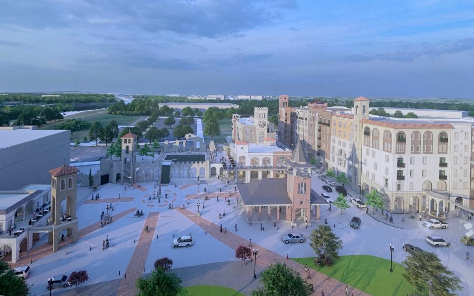 A photo of a rendering of the BridgeWay Station mixed use development in Mauldin taken at a groundbreaking event on April 8, 2021.