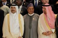 Secretary General of Opec Mohammed Sanusi Barkindo (C), poses with Saudi Energy Minister Khalid al-Falih (R) and OPEC President Qatar's Minister of Energy and Industry Mohammed bin Saleh al-Sada at the 15th International Energy Forum Ministerial (IEF15) in Algiers, Algeria September 27, 2016. REUTERS/Ramzi Boudina