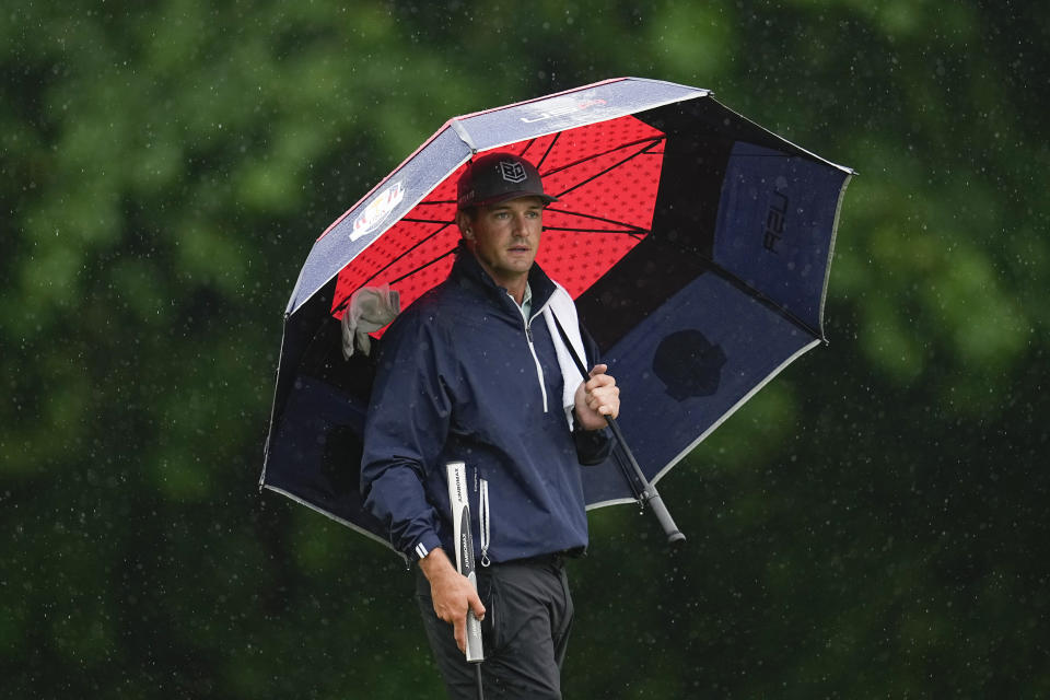 Bryson DeChambeau waits to play on the second hole during the third round of the PGA Championship golf tournament at Oak Hill Country Club on Saturday, May 20, 2023, in Pittsford, N.Y. (AP Photo/Abbie Parr)