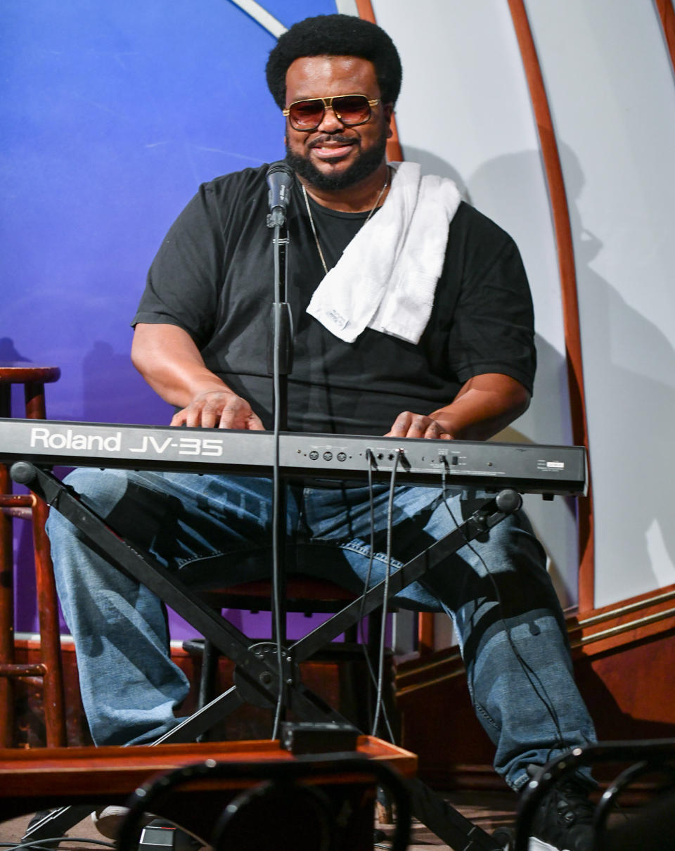 <p>Craig Robinson hits the keys at The Laugh Factory's 42nd annual free Christmas dinner and show event on Dec. 25 in West Hollywood. </p>