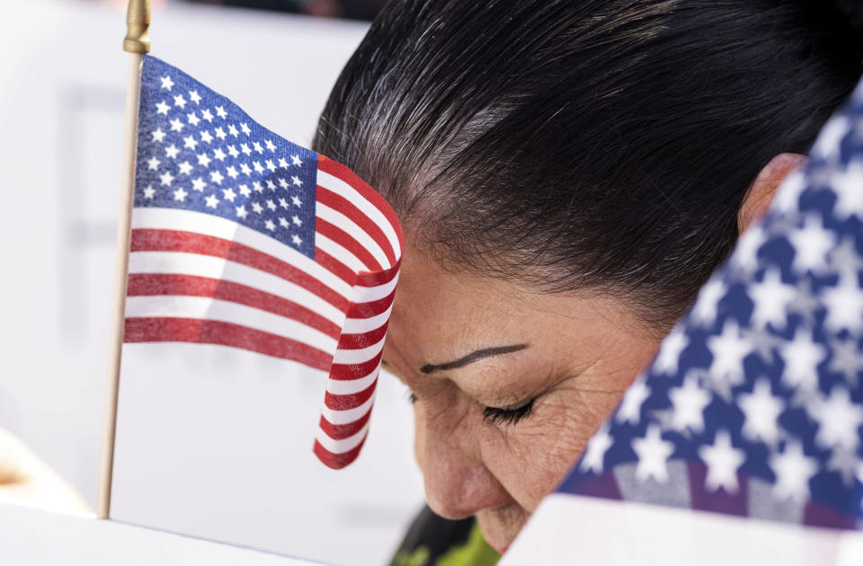 <p>Suki Castillo Ramos, from Socorro, Texas is pictured during a prayer at the “End Family Detention,” event held at the Tornillo Port of Entry in Tornillo, Texas on June 24, 2018, “We just need to put ourselves in their shoes,” Ramos said, referring to the plight of asylum seeker from Central America. (Photo: Paul Ratje/AFP/Getty Images) </p>