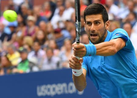 Sept 11, 2016; New York, NY, USA; Novak Djokovic of Serbia hits to Stan Wawrinka of Switzerland in the men's singles final on day fourteen of the 2016 U.S. Open tennis tournament at USTA Billie Jean King National Tennis Center. Mandatory Credit: Robert Deutsch-USA TODAY Sports