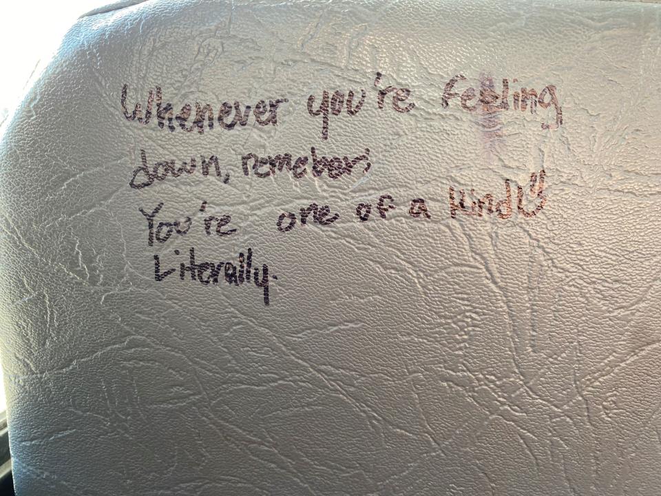 An uplifting message scrawled on the back of an Ames school bus inspired Sara Knight, general manager of Durham School Services, to create a Graffiti Bus full of positive comments for students.