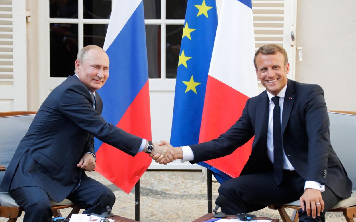 Russia's President Vladimir Putin and France's President Emmanuel Macron met in August - TASS