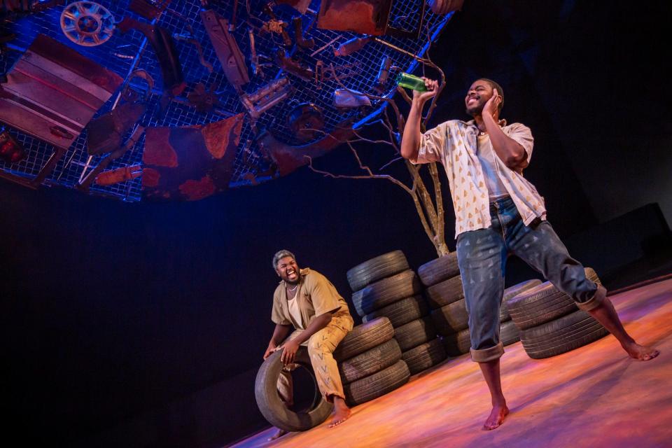 From left, Caleb Barnett and Ibraheem Farmer appear in a scene from Oklahoma City Repertory Theater's Oklahoma premiere production of "The Brothers Size."