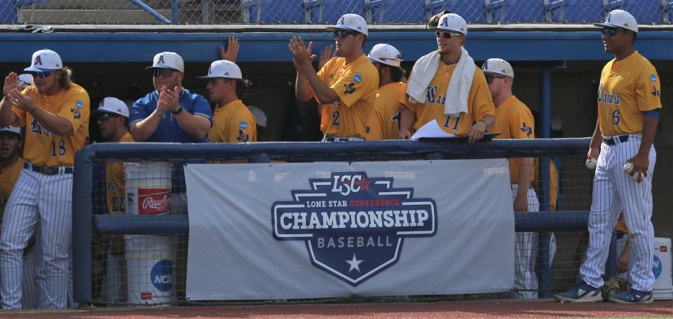 The Angelo State University Rams celebrate in the dugout during the Lone Star Conference Baseball Tournament finals against West Texas A&M at Foster Field at 1st Community Credit Union Stadium on Saturday, May 14, 2022.