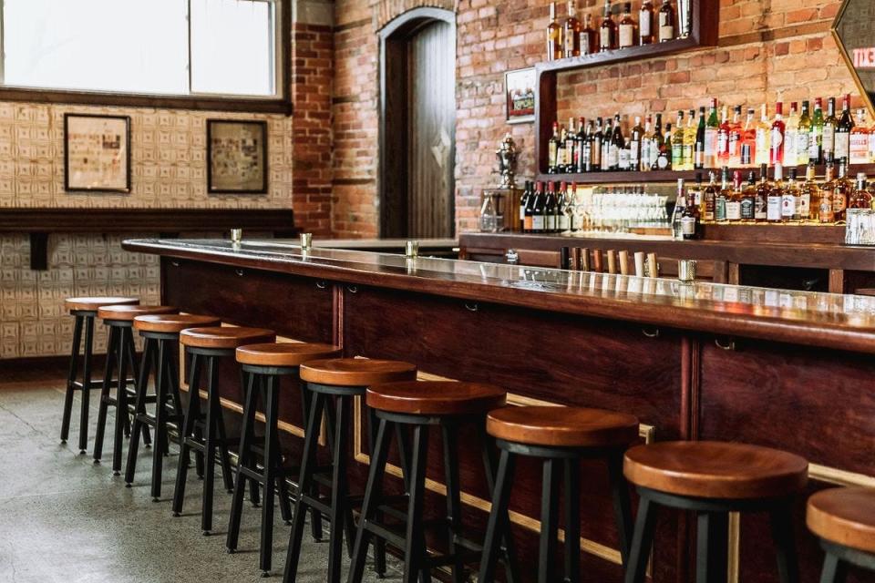 Kiesling is a cozy bar in a cool corner building with a patio, fireplace, and a rich history in Detroit's Milwaukee Junction neighborhood.