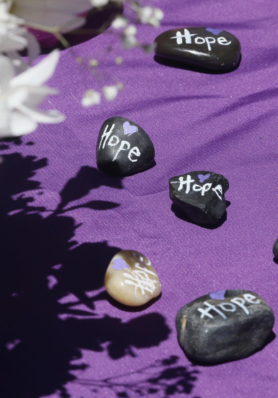Hope stones decorate the registration table.