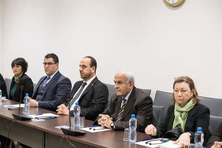 Naser al-Hariri, Head of the Syrian Negotiation Commission (SNC), attends a round of negotiations with United Nations Special Envoy of the Secretary-General for Syria Staffan de Mistura (not pictured), during the Intra Syria talks, at the European headquarters of the U.N. in Geneva, Switzerland December 14, 2017. REUTERS/Xu Jinquan/Pool