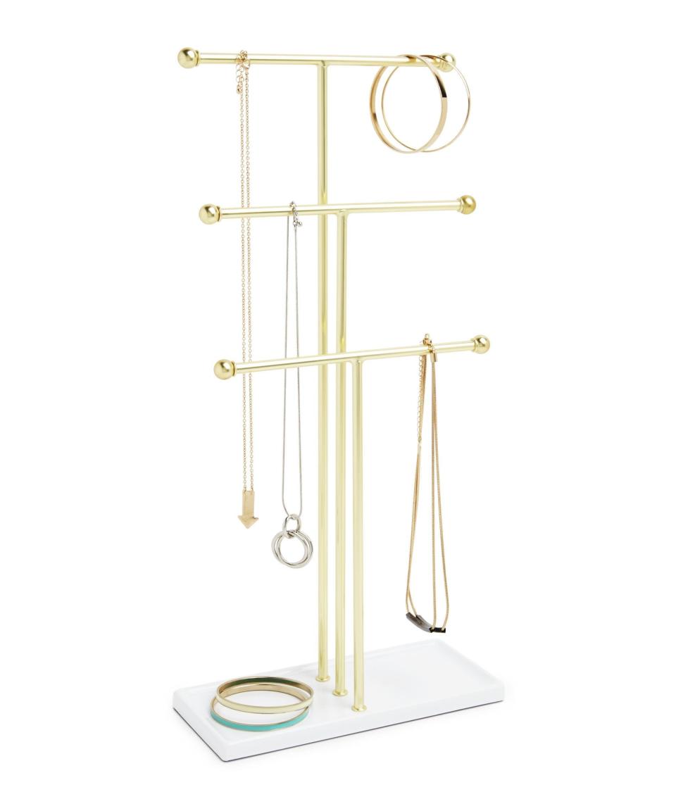 <h2>Umbra</h2><br>Keep all your chains and things super organized and detangled with this nifty jewelry tree.<br><br><strong>Umbra</strong> Umbra Trigem Hanging Jewelry Organizer, $, available at <a href="https://amzn.to/3wYiZzv" rel="nofollow noopener" target="_blank" data-ylk="slk:Amazon" class="link ">Amazon</a>