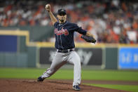 Atlanta Braves starting pitcher Charlie Morton throws during the first inning of Game 1 in baseball's World Series between the Houston Astros and the Atlanta Braves Tuesday, Oct. 26, 2021, in Houston. (AP Photo/Ashley Landis)