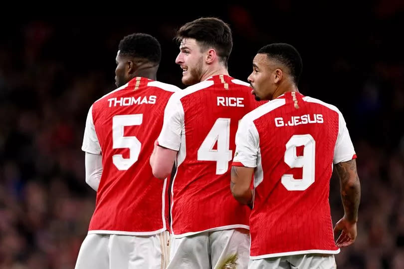 Thomas Partey, Declan Rice and Gabriel Jesus of Arsenal look on during the UEFA Champions League quarter-final first leg match between Arsenal FC and FC Bayern München at Emirates Stadium on April 09, 2024