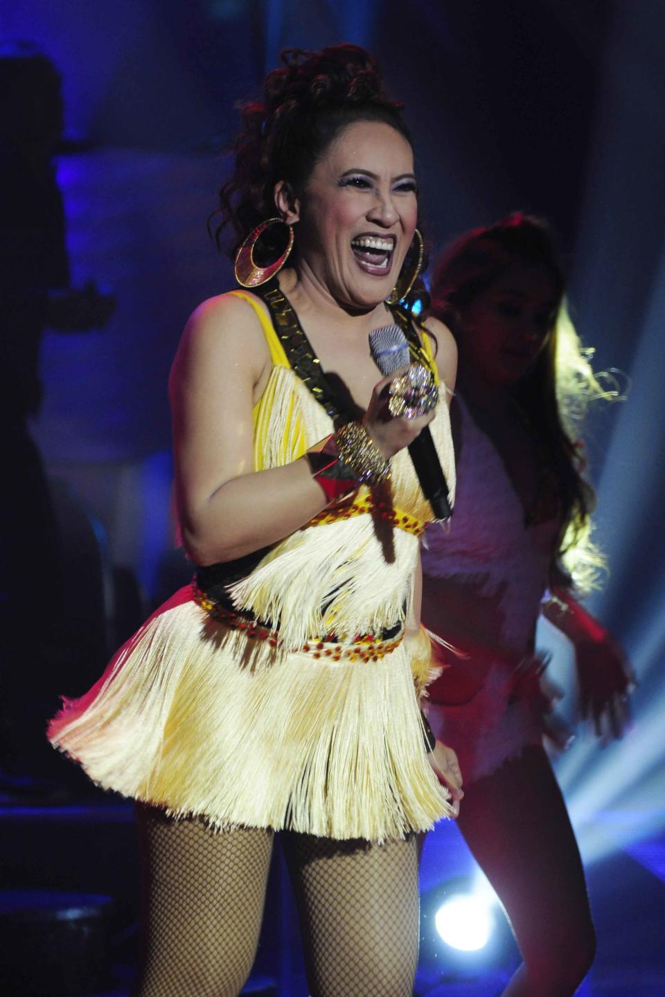 Ai-Ai Delas Alas performs a song and dance number during the 26th Star Awards for TV held at the Henry Lee Irwin Theater in Ateneo De Manila University on 18 November 2012. (Angela Galia/NPPA images)