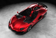 Starting with the everyday 700-hp Aventador, Lamborghini taunted the bull even further by removing the roof, adding several aerodynamic panels and generally shucking weight from a car that only had 3,472 lbs. to begin with. Even the seat fabrics have been swapped for something Lamborghini calls "Carbonskin," a fabric made from carbon fibers that's at least a decade away from being used on a teenager's hat. With no windshield, the interior has to get some form of waterproofing; the rear mirror pops up like Wall-E's head from the center of the dash. It and the roll bars behind the driver are the highest points in the car.