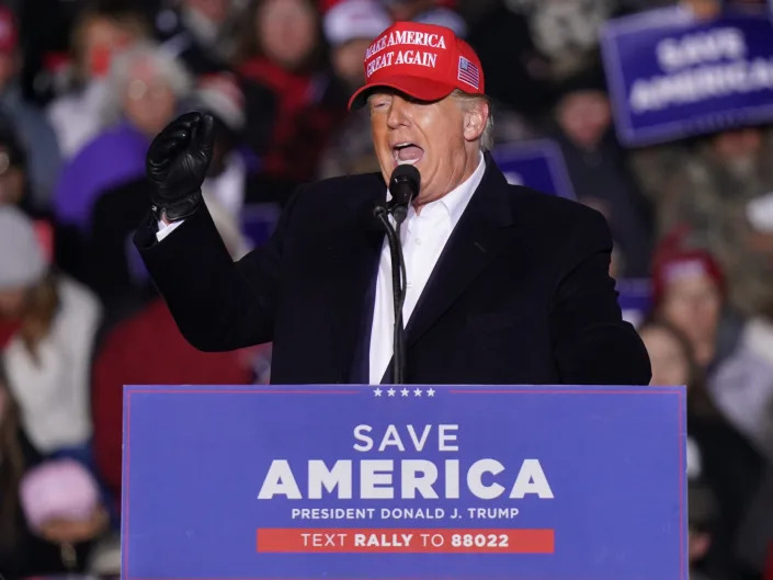 Donald Trump behind a podium at a rally in South Carolina