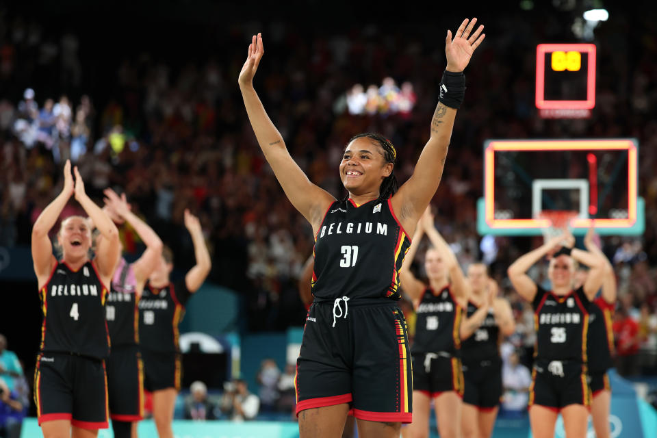 PARIS, FRANCE - AUGUST 07: Maxuella Lisowa Mbaka #31 of Team Belgium waves to fans after winning a Women's Quarterfinal match against Team Spain on day twelve of the Olympic Games Paris 2024 at Stade Pierre Mauroy on August 07, 2024 in Lille, France. (Photo by Gregory Shamus/Getty Images)