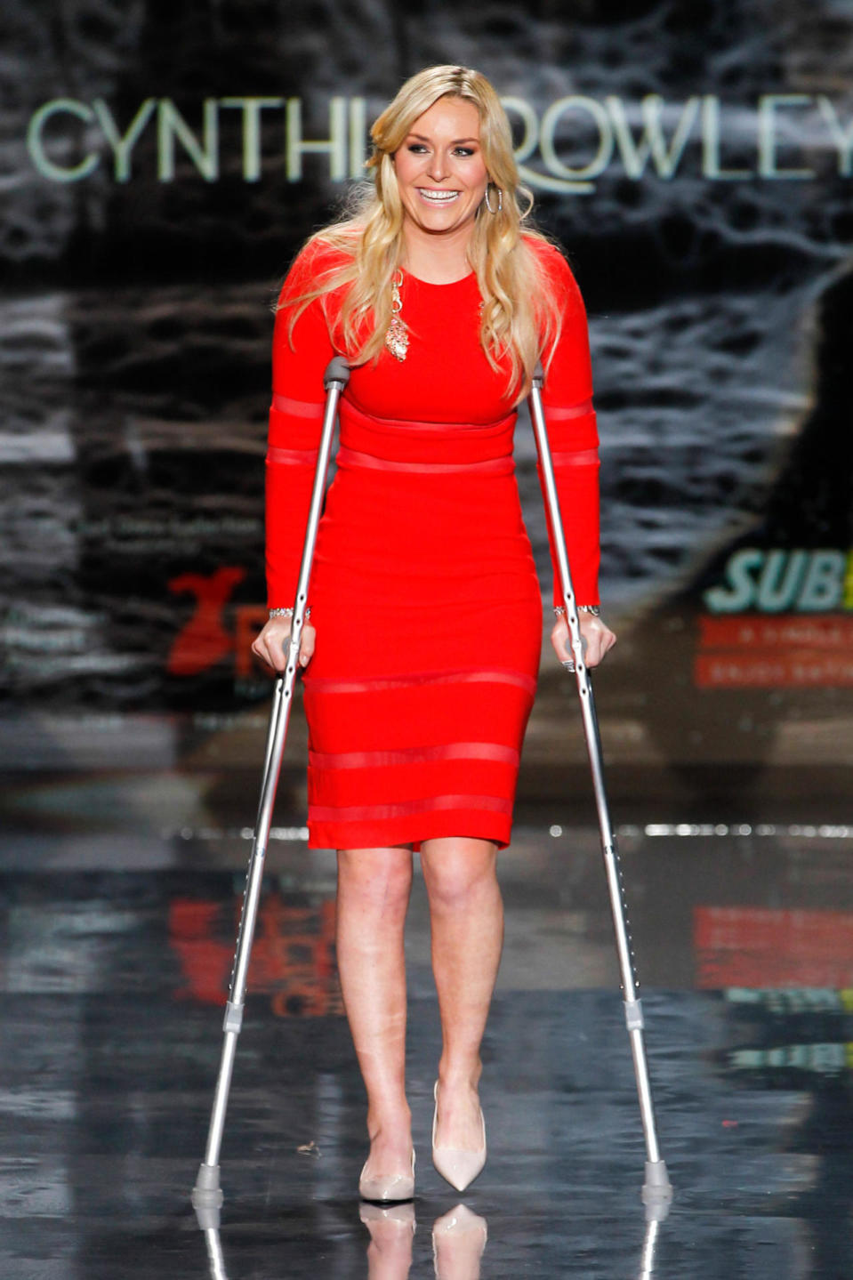 Lindsey Vonn hit the NYFW runway in a red dress and crutches