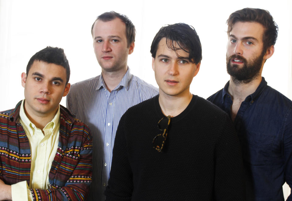 This March 14, 2013 photo shows members of the band Vampire Weekend, from left, Rostam Batmanglij, Chris Baio, Ezra Koenig, and Chris Thomson posing during the SXSW Music Festival in Austin, Texas. The band's latest album, "Modern Vampires of the City," was released on Tuesday. (Photo by Jack Plunkett/Invision/AP)