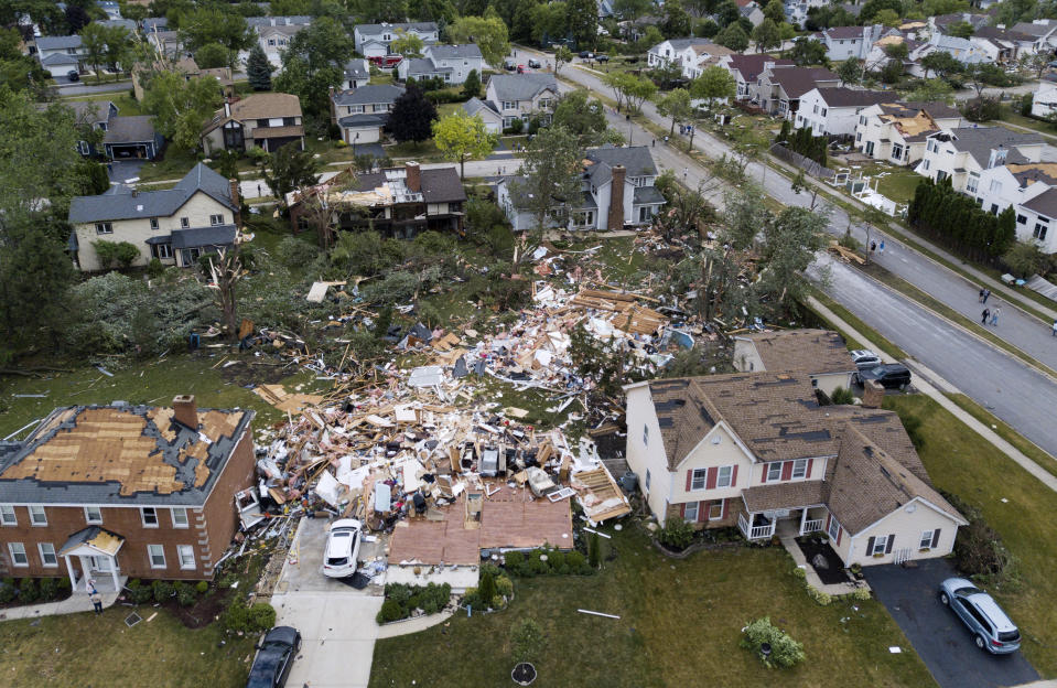 A home on the 1800 block of Princeton Circle is leveled after an overnight tornado swept through the area in Naperville, Ill., Monday, June 21, 2021.(Paul Valade/Daily Herald via AP)