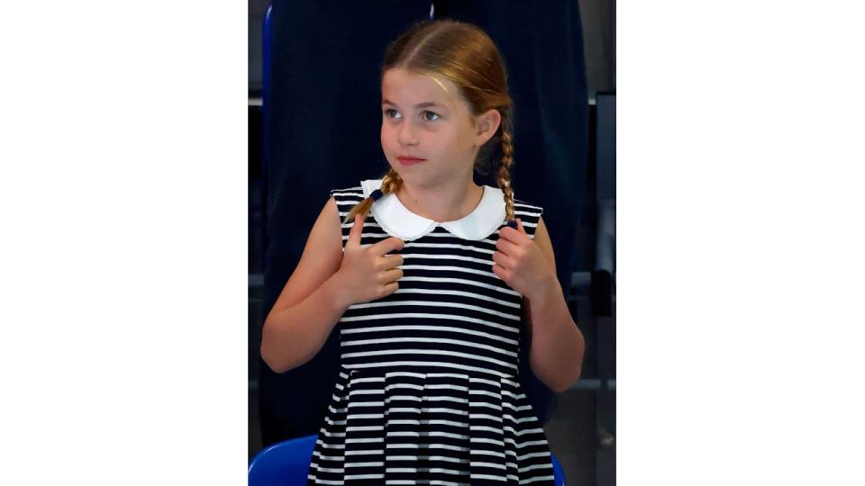 Princess Charlotte in stripes with her hair in braids