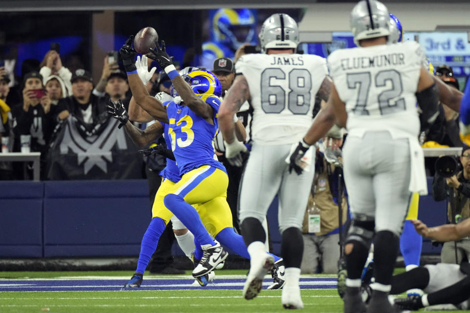 Los Angeles Rams linebacker Ernest Jones (53) makes an interception in the end zone during the first half of an NFL football game against the Las Vegas Raiders, Thursday, Dec. 8, 2022, in Inglewood, Calif. (AP Photo/Mark J. Terrill)