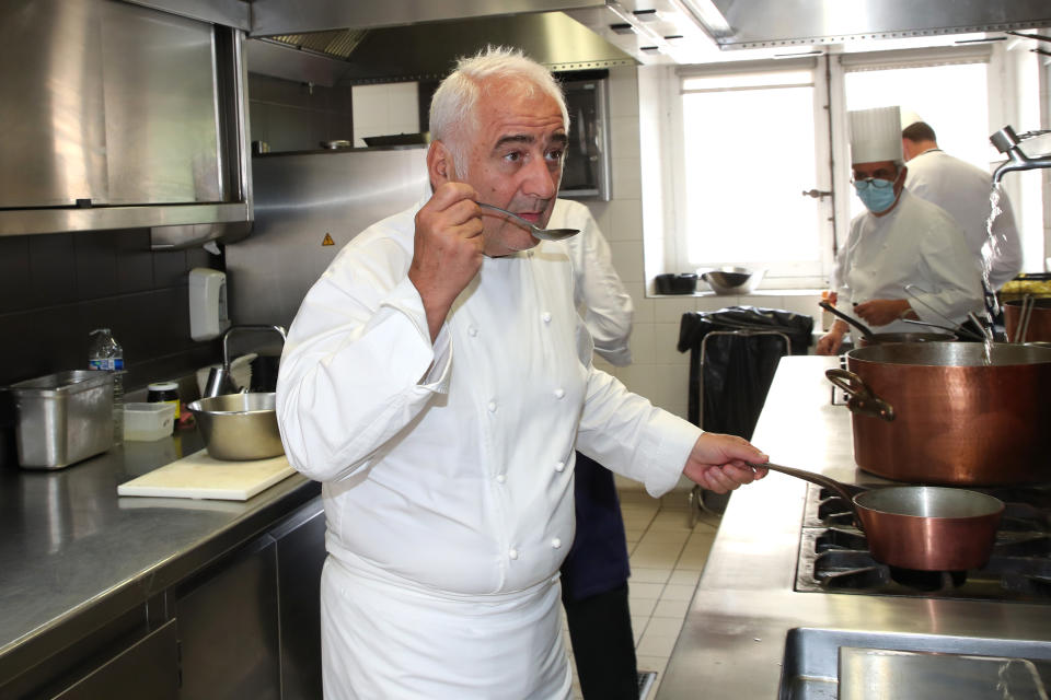 PARIS, FRANCE - JULY 01: Chef Guy Savoy celebrates 50 years of career with his brigade in his 3 Stars Restaurant, 