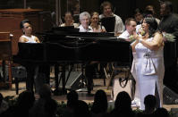 FILE - In this July 27, 2010 file photo, former U.S. Secretary of State Condoleezza Rice, left, and Aretha Franklin perform at The Mann Center for the Performing Arts in Philadelphia. Franklin died Thursday, Aug. 16, 2018 at her home in Detroit. She was 76. (AP Photo/Matt Rourke, File)