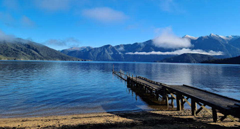 The pair went missing near Lake Hauroko in Fiordland National Park, New Zealand before being found by the journalist and rescued.