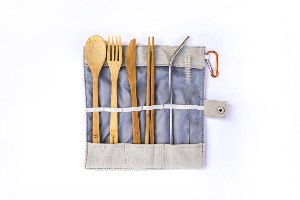 <p>Do your bit to combat plastic waste by bringing along your own bamboo cutlery (plus metal straw) with a handy fabric carry case. This set features a detachable carabiner clip so you hang it off your belt loop or bag. £10.50, <a href="https://www.wildandstone.com/products/organic-reusable-bamboo-picnic-cutlery-set-ideal-for-travel-festivals-lunch-camping-spoon-fork-knife-chopsticks-and-stainless-steel-straw-in-linen-bag-by-wild-stone-8-pieces" rel="nofollow noopener" target="_blank" data-ylk="slk:wildandstone.com;elm:context_link;itc:0;sec:content-canvas" class="link ">wildandstone.com</a></p>