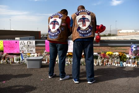 People pay their respects two days after a mass shooting in El Paso