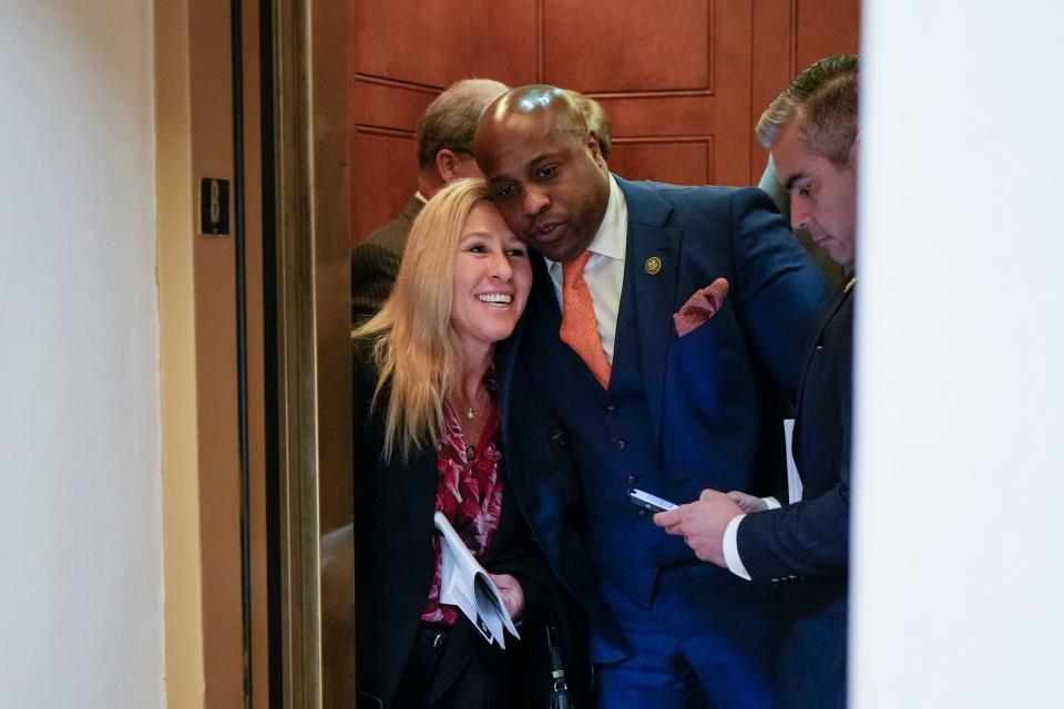 (L-R) Rep. Marjorie Taylor Greene (R-Ga.) talks with Rep. Wesley Hunt (R-Texas) following a closed-door GOP caucus meeting at the U.S. Capitol on Jan. 10, 2023 in Washington, D.C. House Republicans passed their first bill of the 118th Congress on Jan. 9, voting along party lines to cut $71 billion from the Internal Revenue Service, which Senate Democrats said they would not take up.