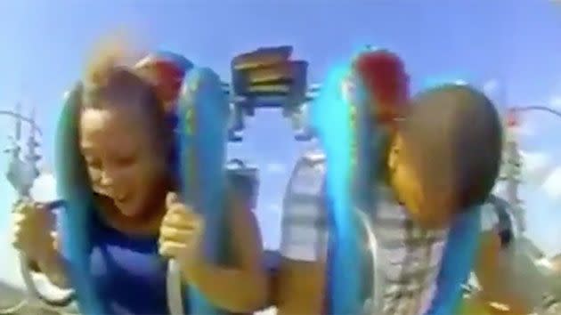 Young girl terrified by slingshot ride